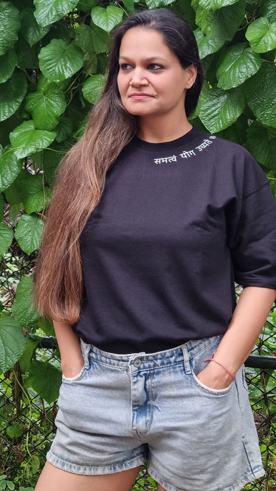 Motivation Unlimited Raven Black T-shirt worn outdoors, tall editorial fit view