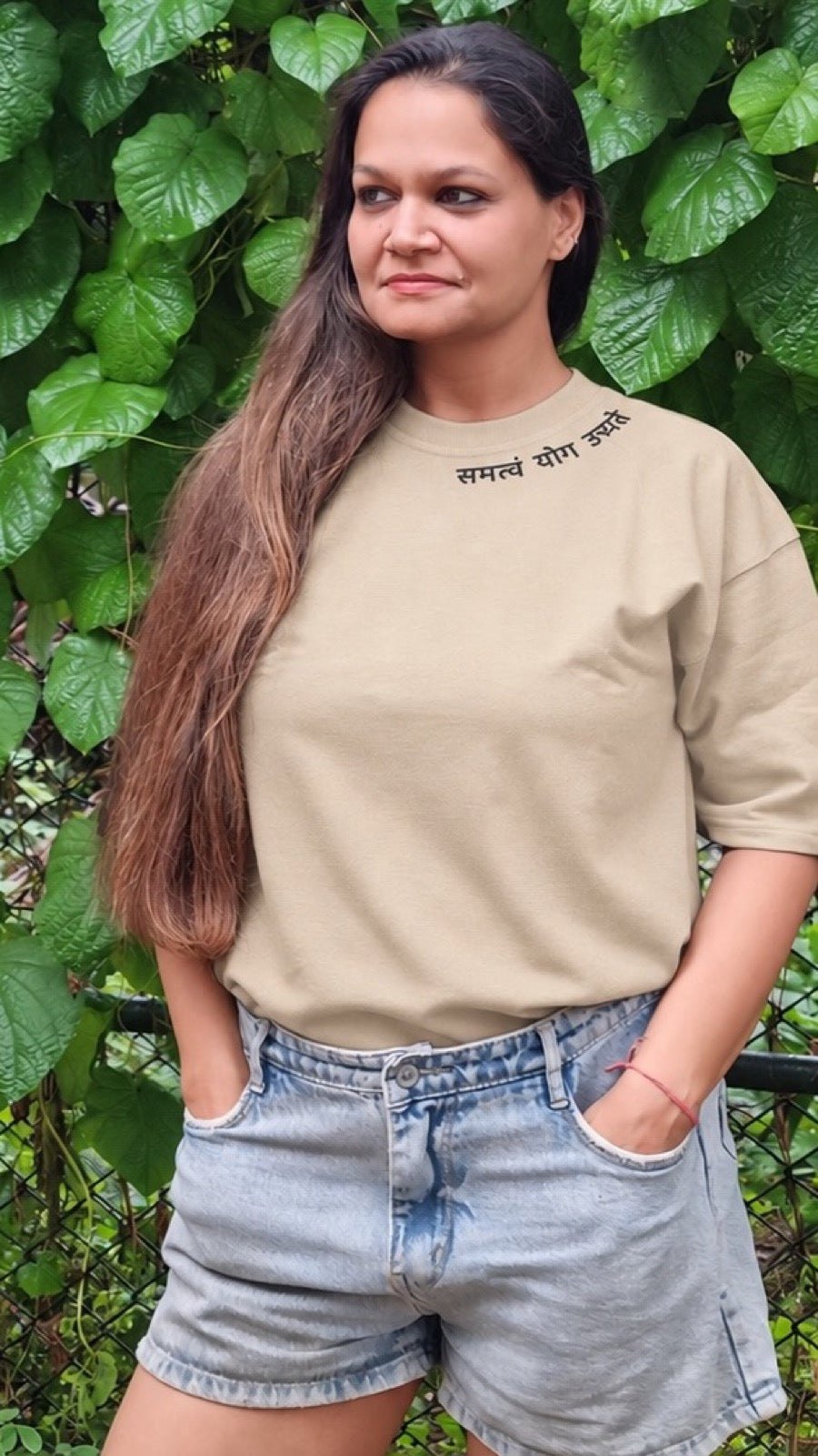 Motivation Unlimited Sandy Beige T-shirt worn outdoors, tall editorial fit view