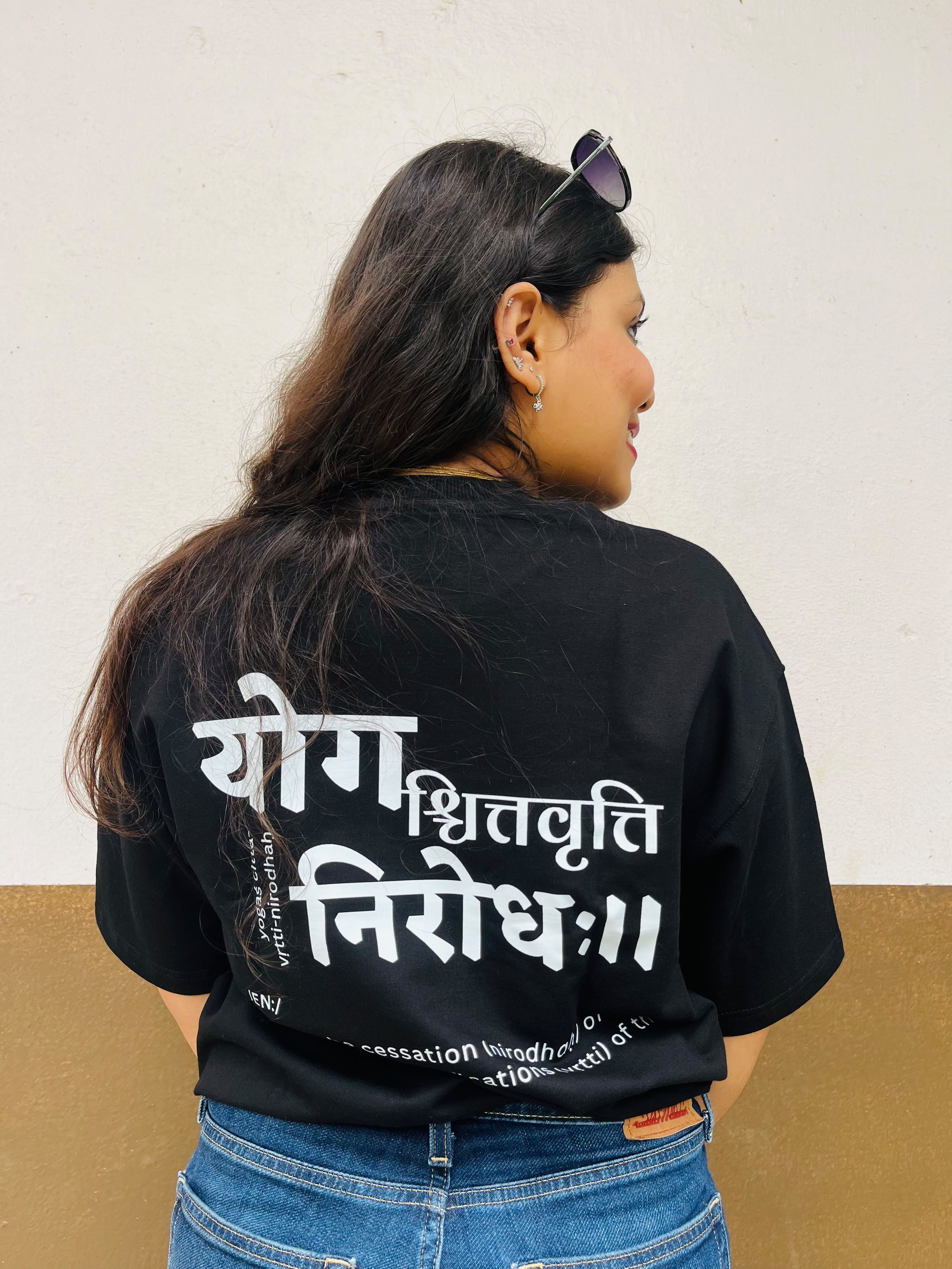 Don’t Overthink It T-shirt in Raven Black, worn outdoors, close back view