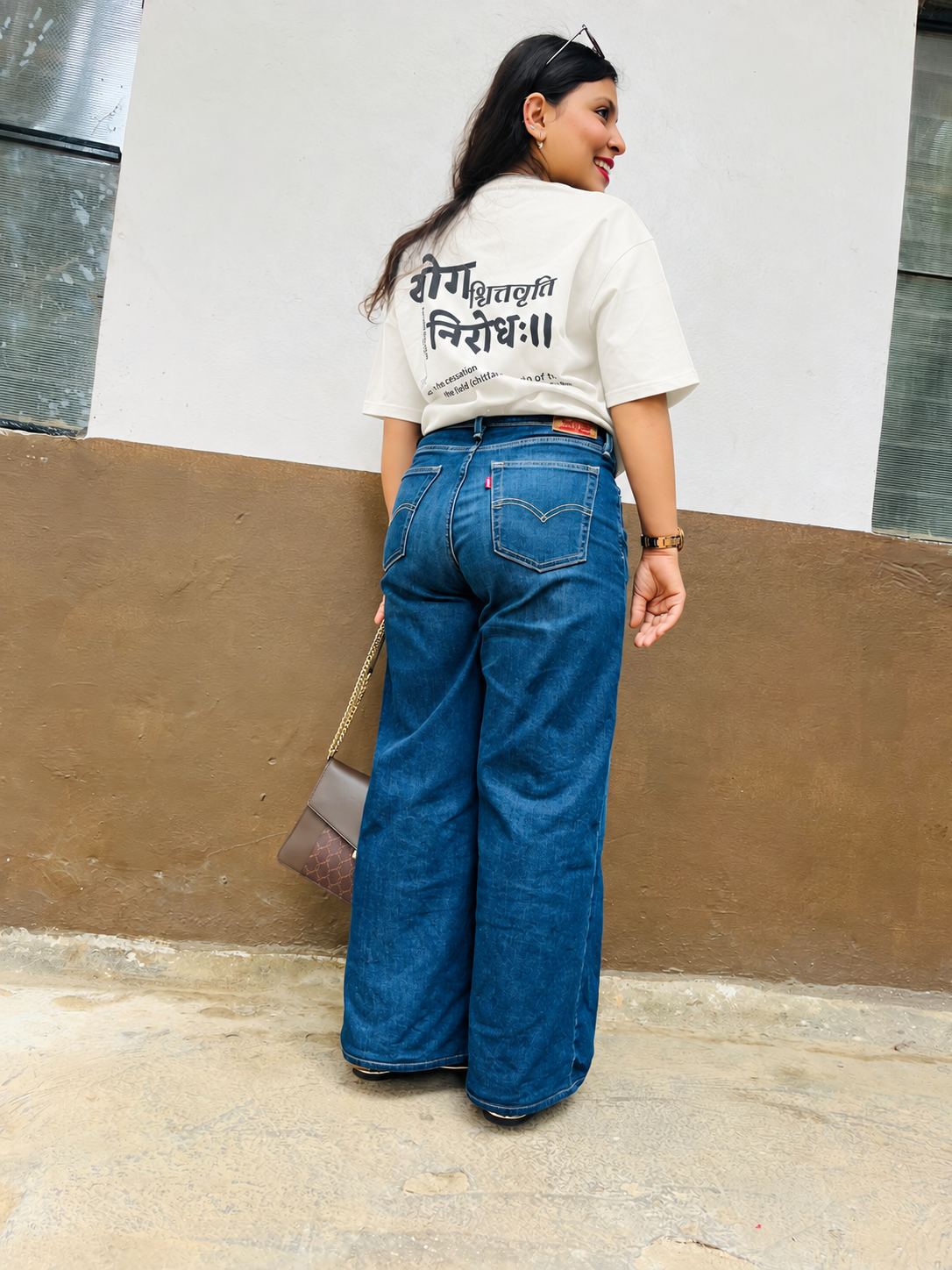 Don’t Overthink It T-shirt in Chalk White, worn outdoors, full-length back view