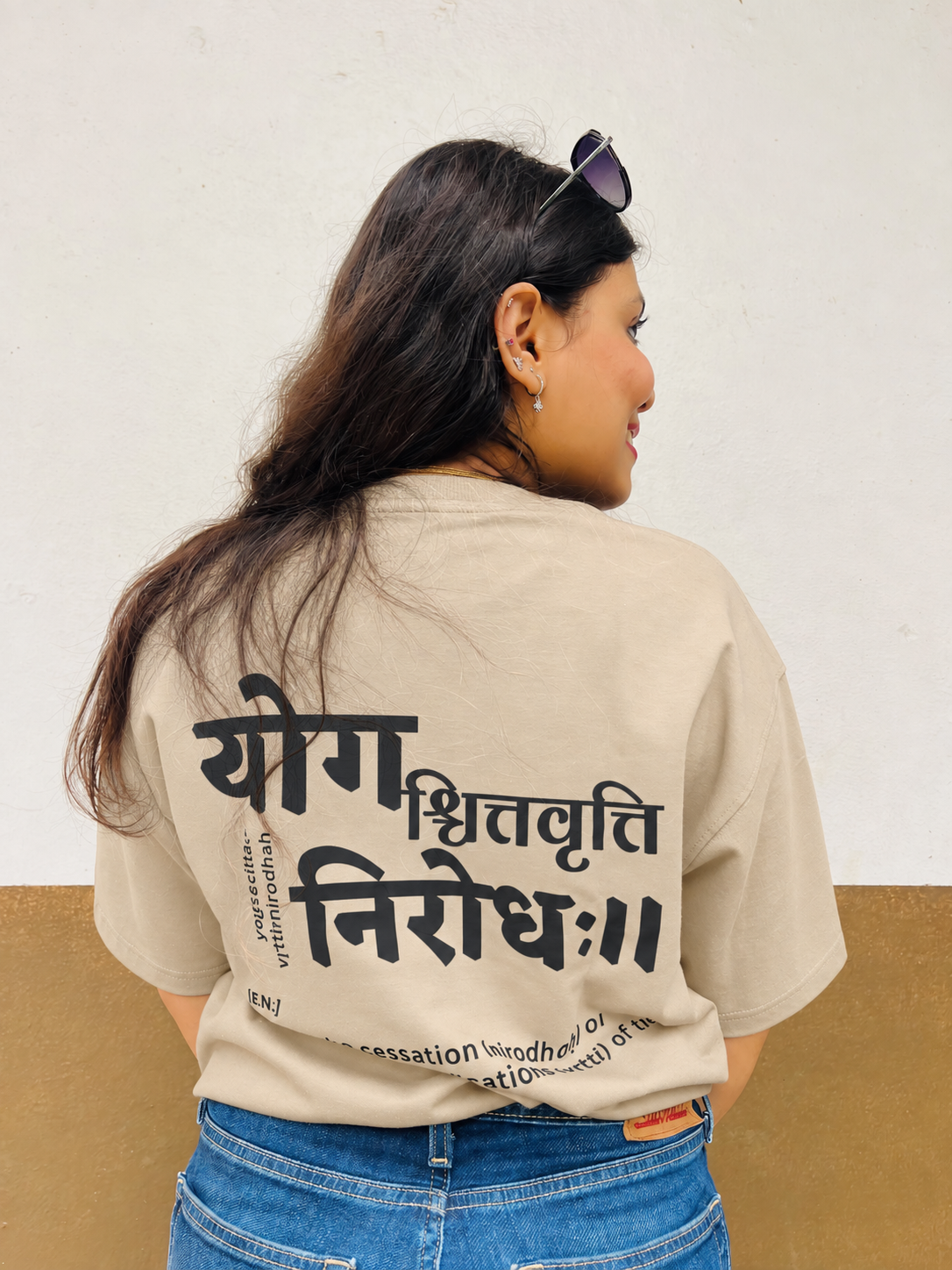 Don’t Overthink It T-shirt in Sandy Beige, worn outdoors, close back view