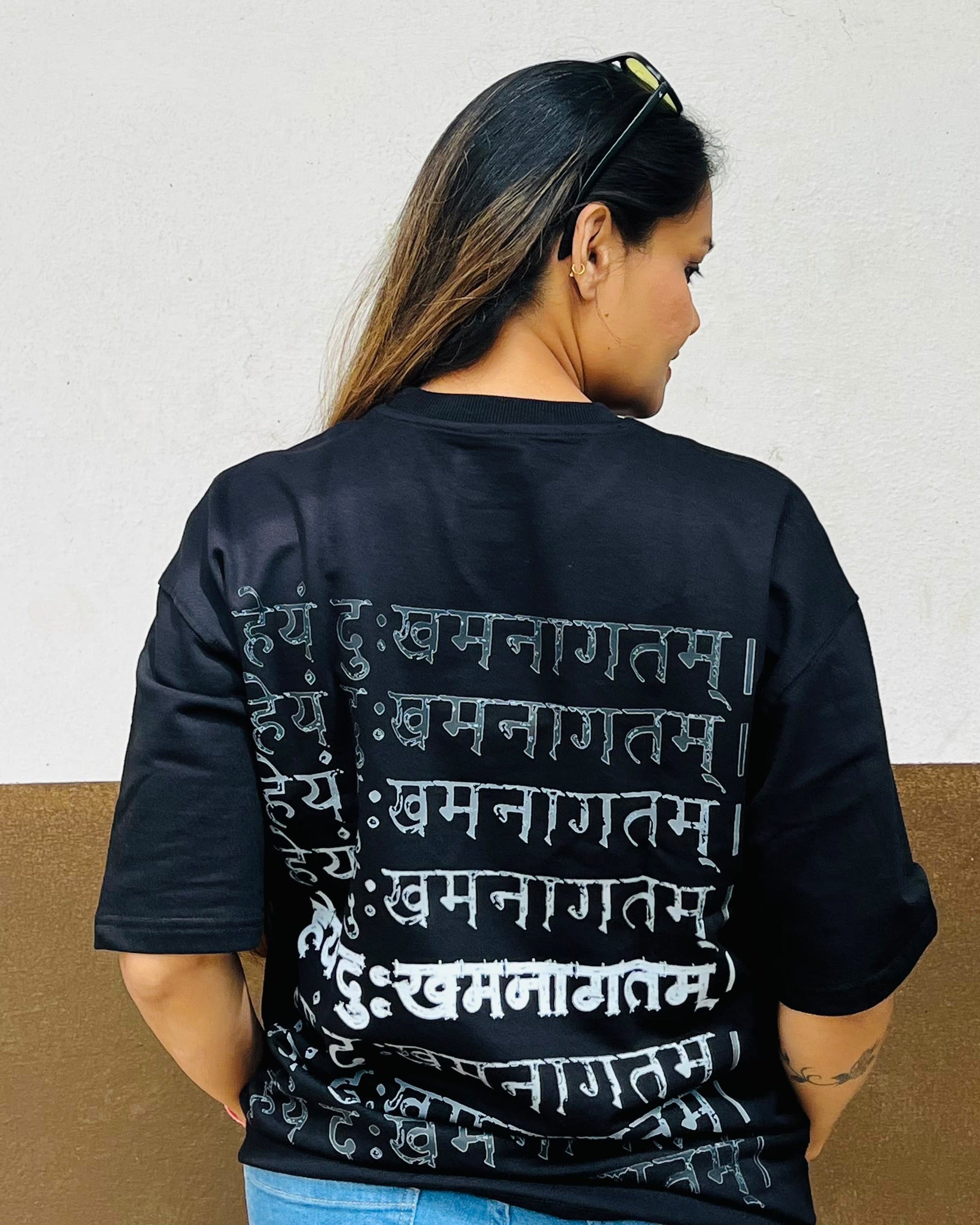 Future Manifested II Raven Black T-shirt worn outdoors, complete back view